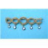 Image 1 : A gold bar brooch, designed as five graduated open circles each supporting a diamond drop...