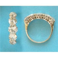 A Victorian five-stone diamond half hoop ring, the old brilliant cut stones claw-set in 18ct gold...