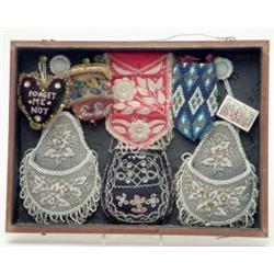 A collection of 6 Victorian beadwork purses, including a pair in grey, white and silver beads wit...