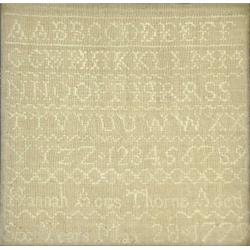A small George III alphabet sampler, dated 1779 with ivory silk lettering and numbers by Hannah T...