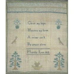 A George IV needlework sampler, dated 1823, embroidered in silk with a pious verse, an alphabet a...