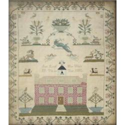A George III needlework house sampler, worked in coloured silks and decorated with floral motifs...
