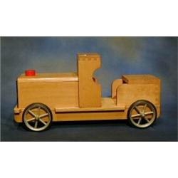 A childs beech framed push a long model locomotive £20-30...