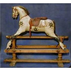 A Victorian rocking horse £300-500...