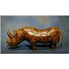 Image 1 : A leather foot stool in the form of a rhinoceros 30" £100-150...