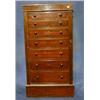 Image 1 : A Victorian mahogany Wellington chest of 7 drawers 23" £400-600...