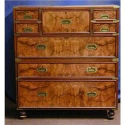 A 19th Century figured camphor wood military secretaire chest the secretaire drawer flanked by 2...