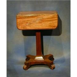 A William IV rectangular mahogany drop flap work table fitted 2 drawers and raised on a chamfered...