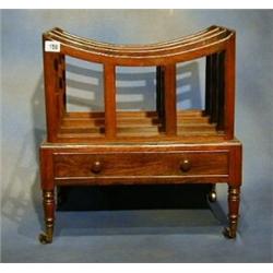 A 19th Century rosewood 3 division Canterbury the base fitted a drawer and raised on turned suppo...
