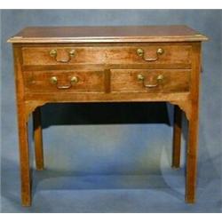 A Georgian mahogany side table fitted 1 long and 2 short drawers raised on square supports 32" £5...