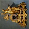 Image 1 : A 19th Century French 8 day striking mantel clock contained in a gilt spelter case supported by a...