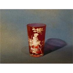 A "Mary Gregory" ruby glass beaker decorated a child amidst tree £25-45...