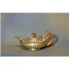 Image 1 : A George III circular silver teapot with demi-reeded decoration London 1821 9 ozs £100-150...
