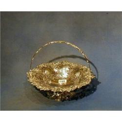 A Victorian circular pierced silver plated cake basket by A B Savory & Sons London £50-75...