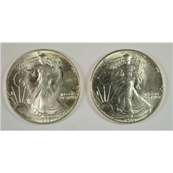 (2) 1986 AMERICAN SILVER EAGLES, UNC. COINS MAY HAVE SLIGHT SCRATCH/IMPERFECTION