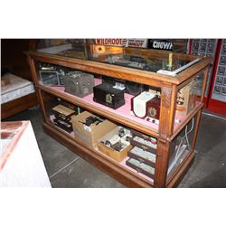 EARLY 1900S OAK FRAMED GLASS SHOWCASE