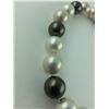 Image 2 : ONE CHOKER LENGTH STRAND OF MAJORCA STYLE BLACK  AND WHITE SIMULATED PEARLS, 33 BEADS