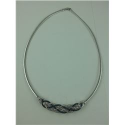 LADIES OMEGA FRONTAL TWIST NECKLACE SET WITH 25 BLUE AND WHITE DIAMONDS. INCLUDES $700 CERTIFICATE