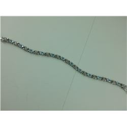 6+ CARAT BLUE TOPAZ AND DIAMOND TENNIS BRACELET. INFINITY DESIGN. INCLUDES $500 CERTIFICATE