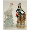 Image 1 : A 19th Century Staffordshire Bird, on a naturalistic base, 29 cm, and a figure of a Highland gent...