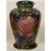 Image 1 : A Moorcroft Pomegranate Baluster Vase, 9 cm   See illustration £50-70...