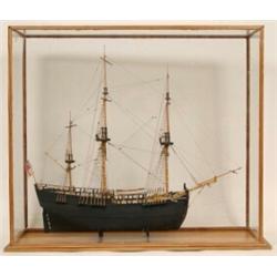 A Model of HMS Endeavour, in a glass case   See illustration £100-200...