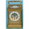 Image 1 : A Japy Freres Carriage Clock, with enamel annular chapter ring, rococo style engraved brass mask,...