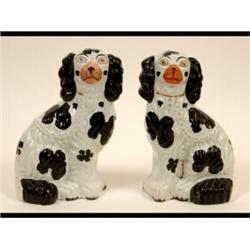 A Pair of Victorian Staffordshire Pottery Dogs, black and white (a.f. ) 25.5 cm  See illustration...