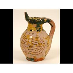 A Late 18th Century Puzzle Jug, initialed I M and dated 1795, decorated flowers, (loss to glaze),...