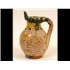 Image 1 : A Late 18th Century Puzzle Jug, initialed I M and dated 1795, decorated flowers, (loss to glaze),...