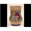 Image 1 : A Charlotte Rhead Baluster Vase, decorated flowers, No 149, 18 cm   See illustration £150-200...