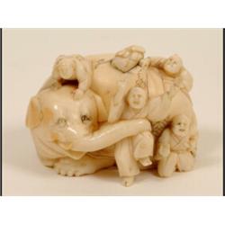 A Late 19th Century Ivory Ojiime, carved an elephant and four figures, 3 cm  See illustration £10...
