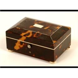 A Small Victorian Tortoiseshell Box, the hinged lid inset a mirror, on four ivory bun feet, 8 cm...