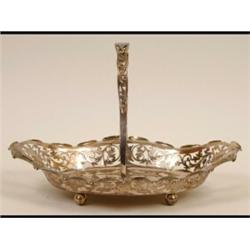 A Pierced Silver Swing Handle Basket, on ball feet, Sheffield 1903  See illustration £100-150...