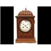 Image 1 : An Edwardian Mantle Clock, with Arabic numerals, striking on a gong, in an inlaid mahogany case,...