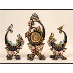A Victorian Majolica Clock Garniture, the dial signed A Mesnard Bordeaux, with Arabic numerals, f...