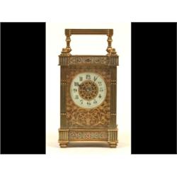 A Late 19th Century Carriage Timepiece, in a reeded brass case, 15 cm   See illustration £100-150...