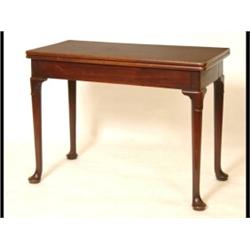 A Mid 18th Century Mahogany Card Table, the fold over top on a concertina action base, on four le...