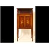 Image 1 : An Edwardian Mahogany Music Cabinet, having a shelf above a paneled door inlaid musical instrumen...