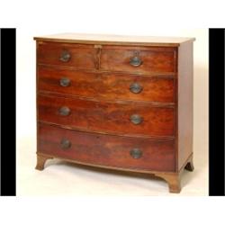 A George III Mahogany Bow Front Chest, of two short and three graduated long drawers, on splay br...