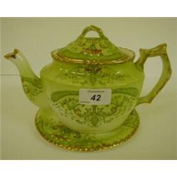 A Late Victorian Tea Set, with floral decoration on a green ground £30 - 50...