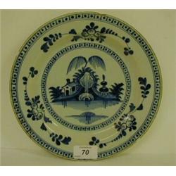 A 19th Century Delft Plate, decorated in underglaze blue, 23 cm (rim chips)...