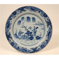 An Early 19th Century Chinese Charger, painted in underglaze blue figures, within a border decora...