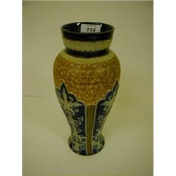 A Doulton Lambeth Vase, with stylised leaf decoration, 27 cm £30 - 50...