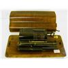 Image 1 : A Muldivo Calculator, in an oak travelling case, 39 cm £20 - 30...