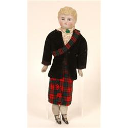A Late Victorian Bisque Head and Shoulders Doll, with bisque lower limbs, 31 cm  See illustration...