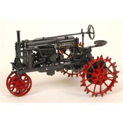 A Precision Series Farmall Regulator, two Little Genius plows, and a 1953 Ford NAA Golden Jubilee...