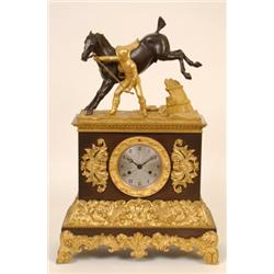 A 19th Century Mantle Clock, the 9 cm diameter dial with Roman numerals, fitted an eight day move...