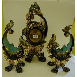 A Victorian Majolica Clock Garniture, the dial signed A Mesnard Bordeaux, with Arabic numerals, f...