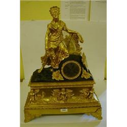 A 19th Century French clock, the 8.5 cm diameter dial with Roman numerals, fitted an 8 day moveme...